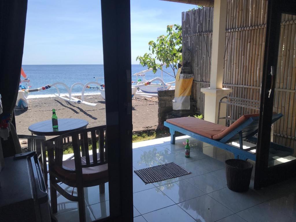 Tambun Sari Beach Homestay Амед Экстерьер фото
